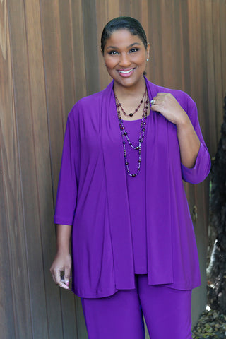 woman wearing a purple kimono jacket