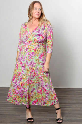 woman wearing a print faux wrap maxi dress