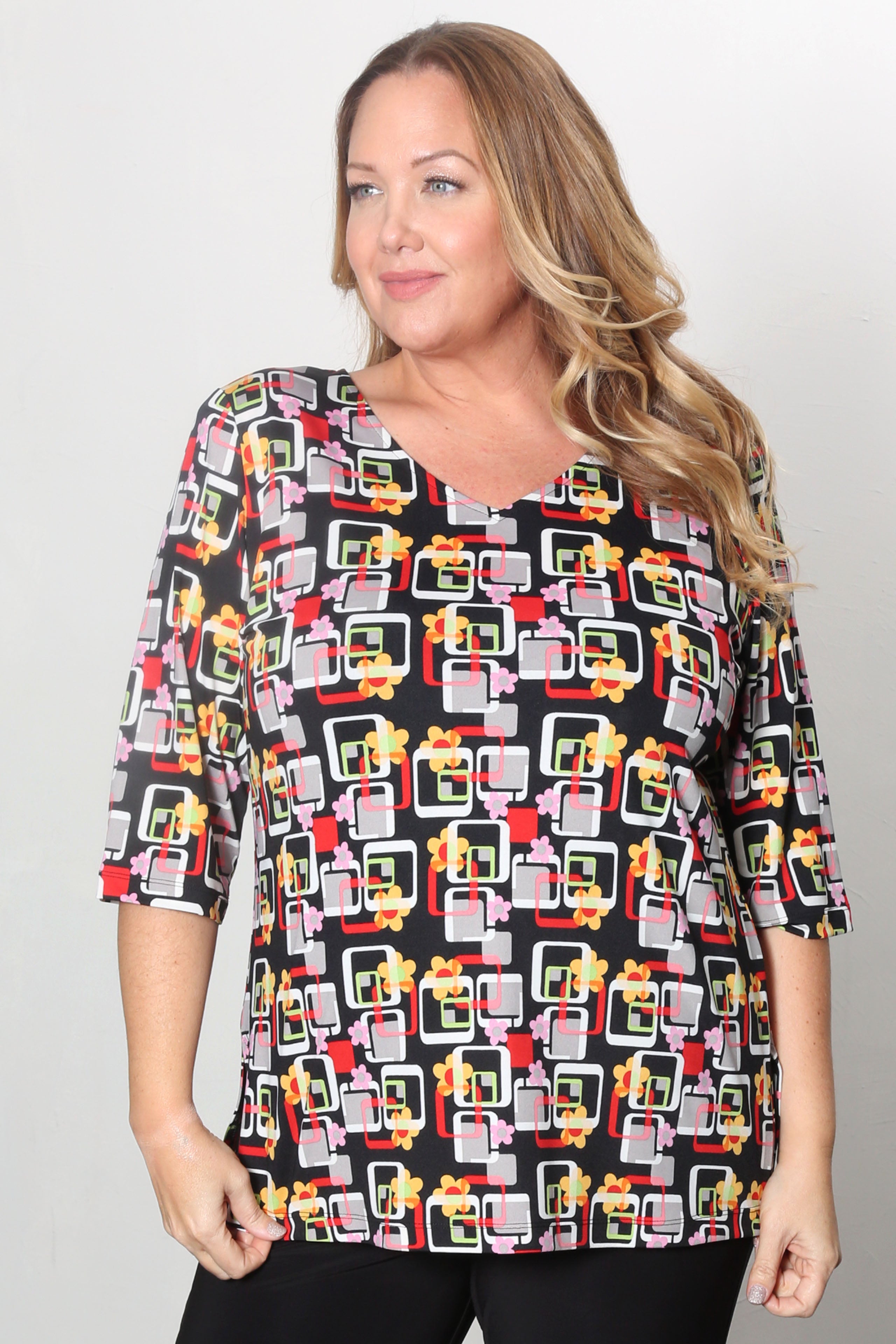woman wearing a mod print top