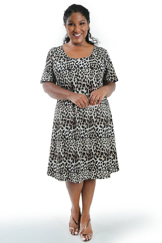 woman wearing an animal print dress