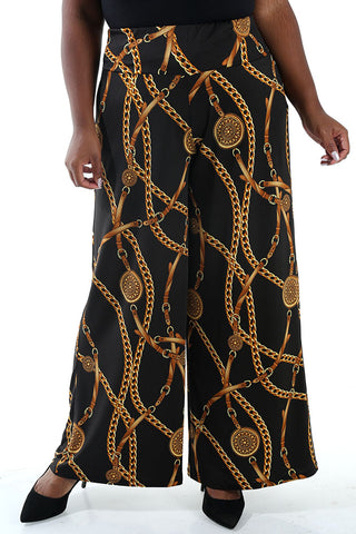 woman wearing black chain print wide leg pants