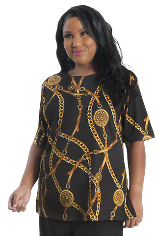 woman wearing a black and gold chain print top