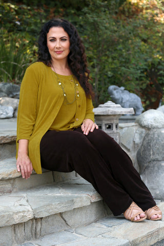 woman wearing gold yellow separates