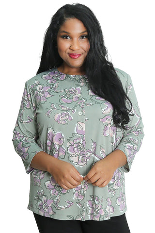 woman wearing a pastel print top