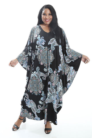 woman wearing a blue floral caftan