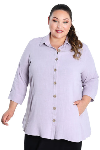 woman wearing a lavender top