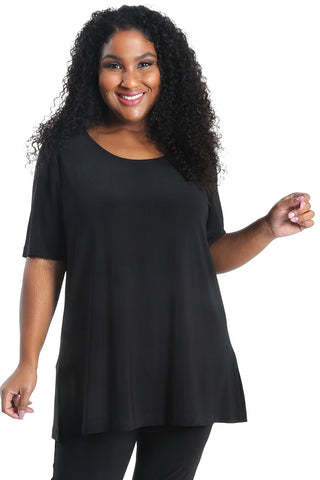 woman wearing a black short sleeved a-line tee