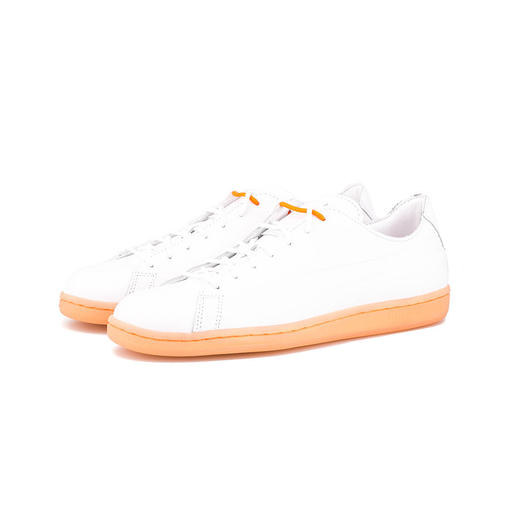 orange and white puma