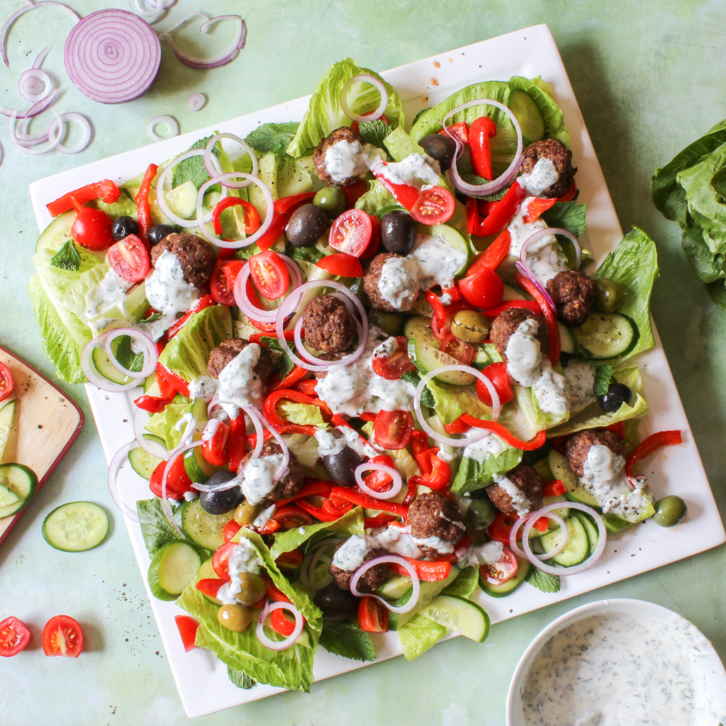 Greek lamb meatball salad with mint yogurt dressing