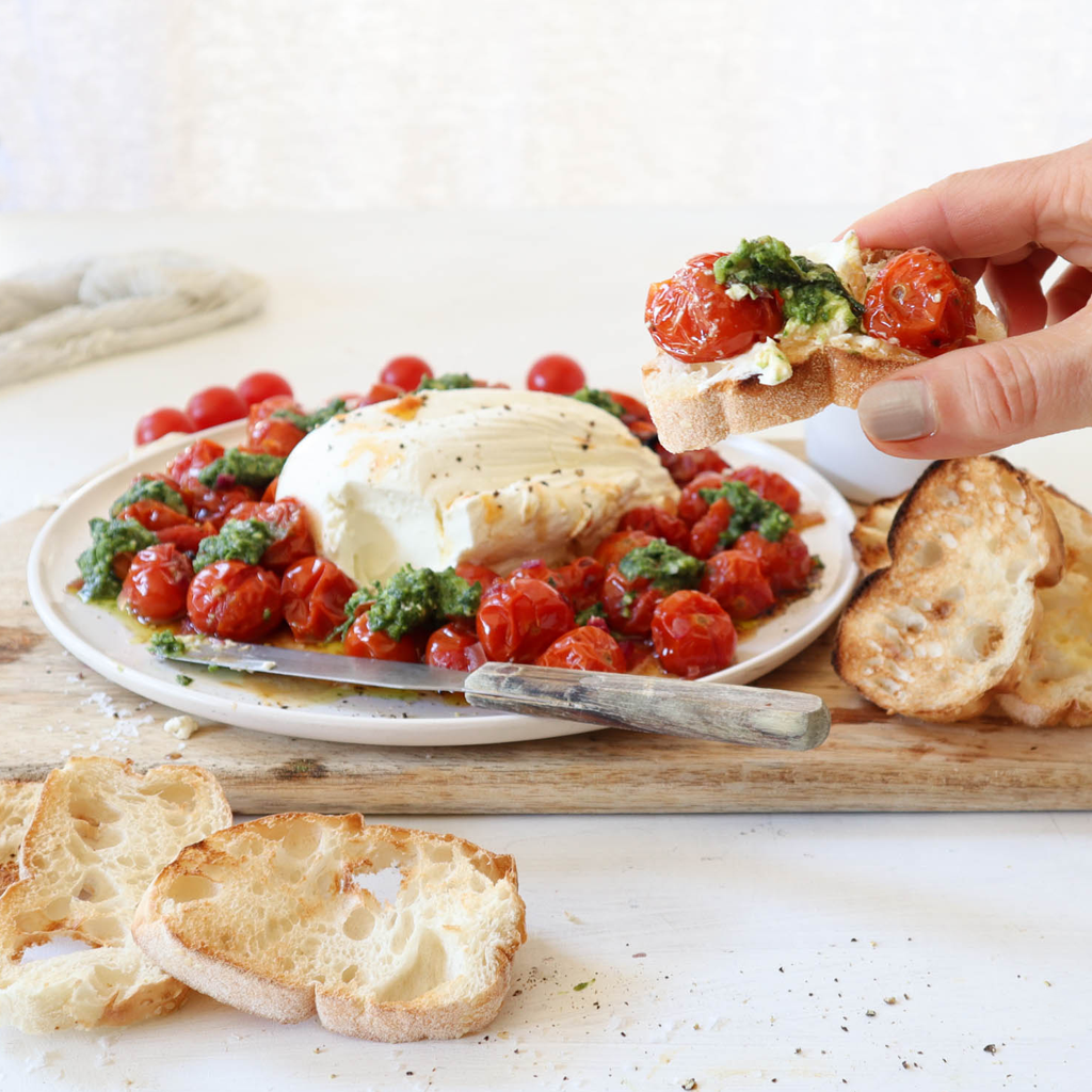 Labneh with roast cherry tomatoes and pesto