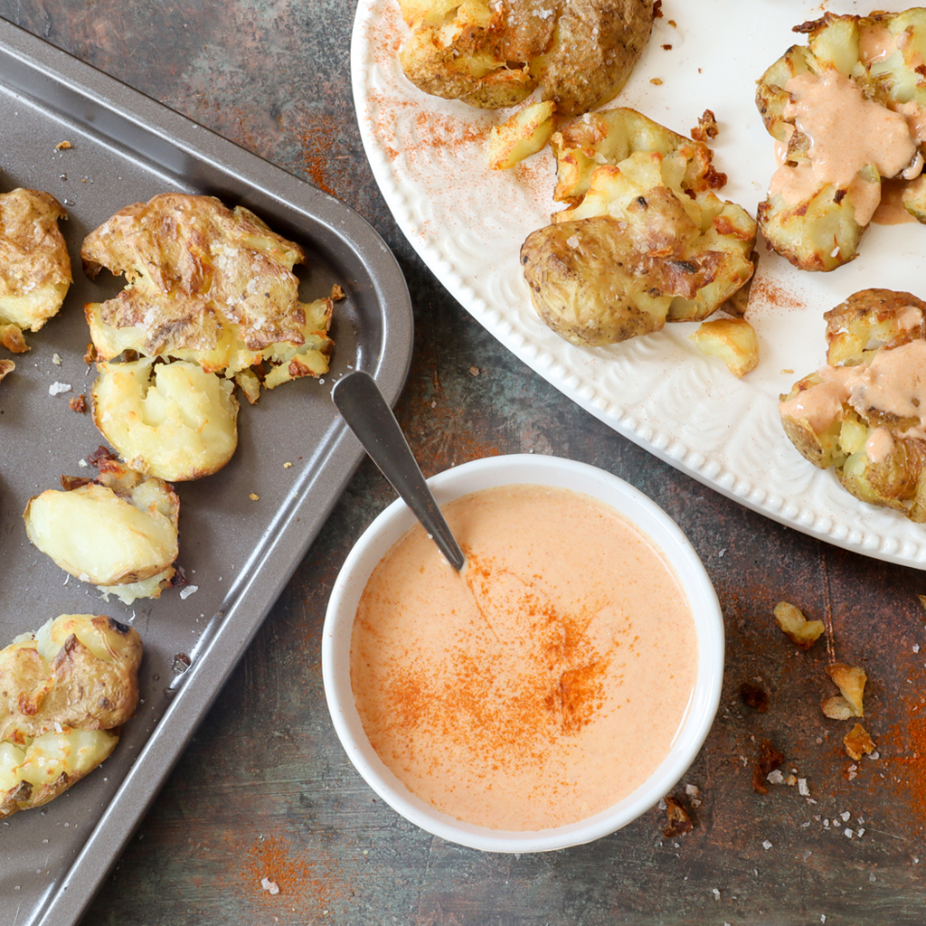 smashed potatoes with spicy yogurt sauce