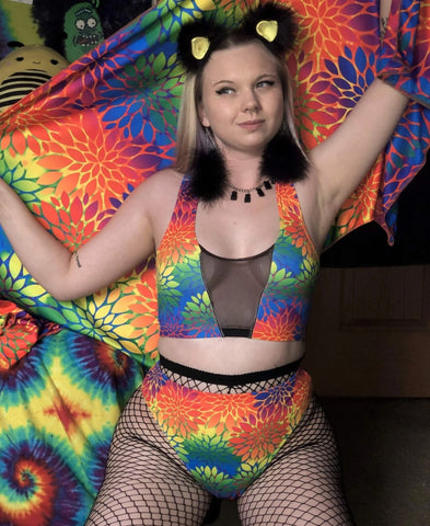 woman wearing rainbow color ravewear