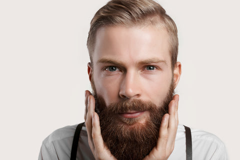 Man Touching His Beard | Does Using a Beard Comb Help?