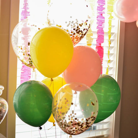 Confetti balloon bouquet with green yellow and pink