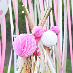 teepee with honeycombs and streamers