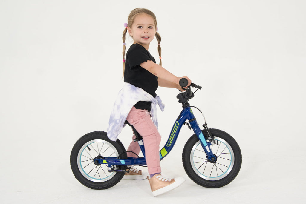 child on bike