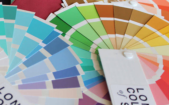 Colour swatches fanned out in rainbow of colours