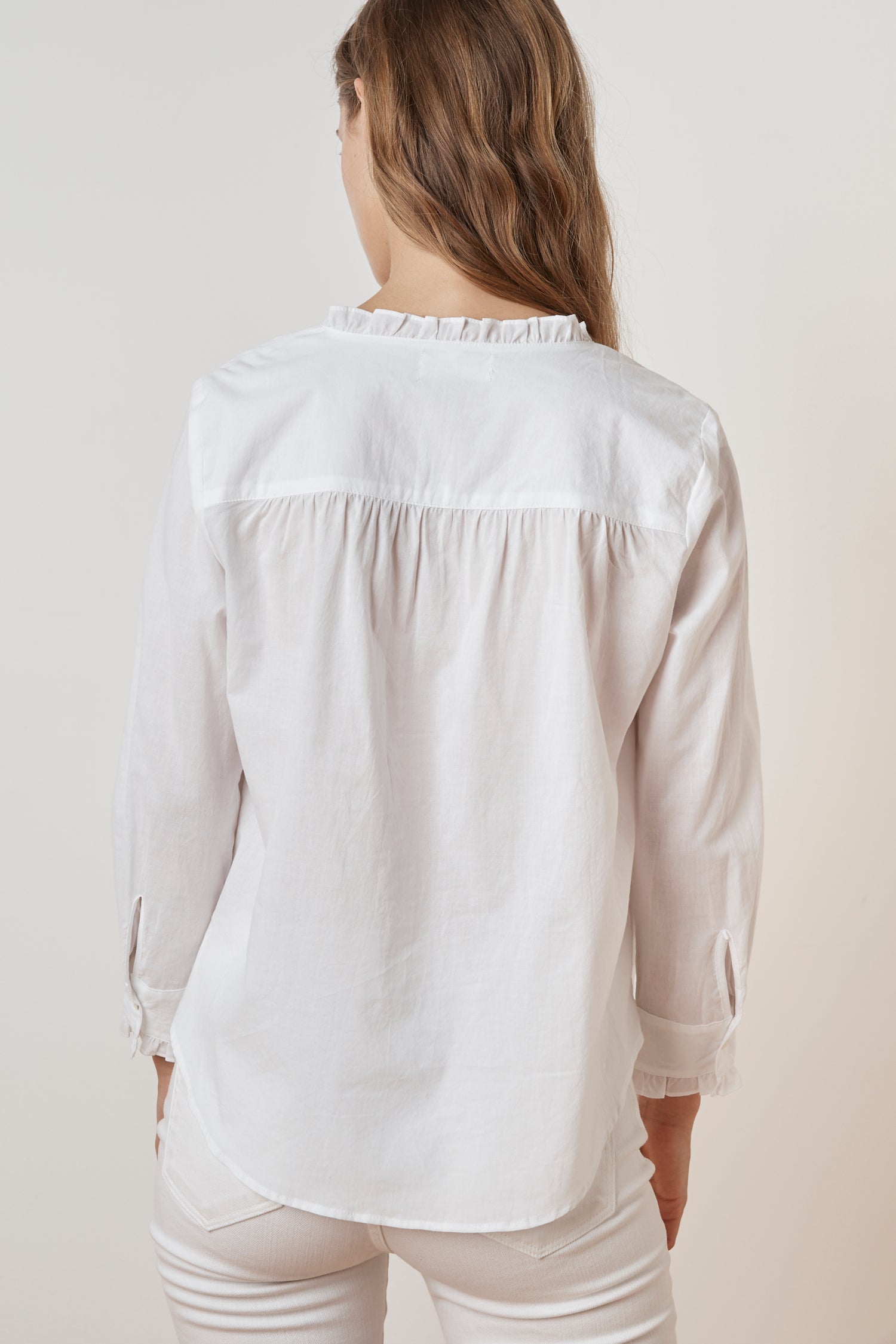 white button up ruffle shirt