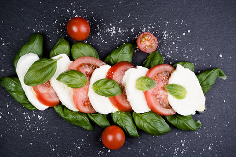 caprese salad for summer with tomatoes and mozzarella