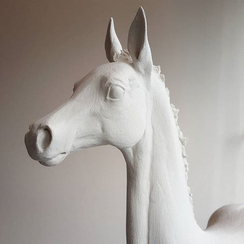 Clay horse head sculpture by Susie Benes