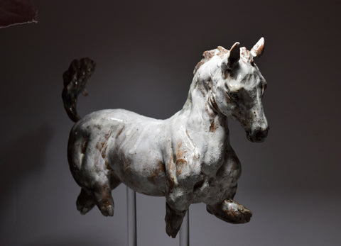 trotting ceramic horse sculpture by Susie Benes