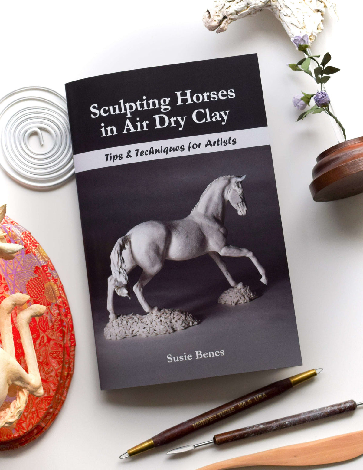 clay sculptures of horses