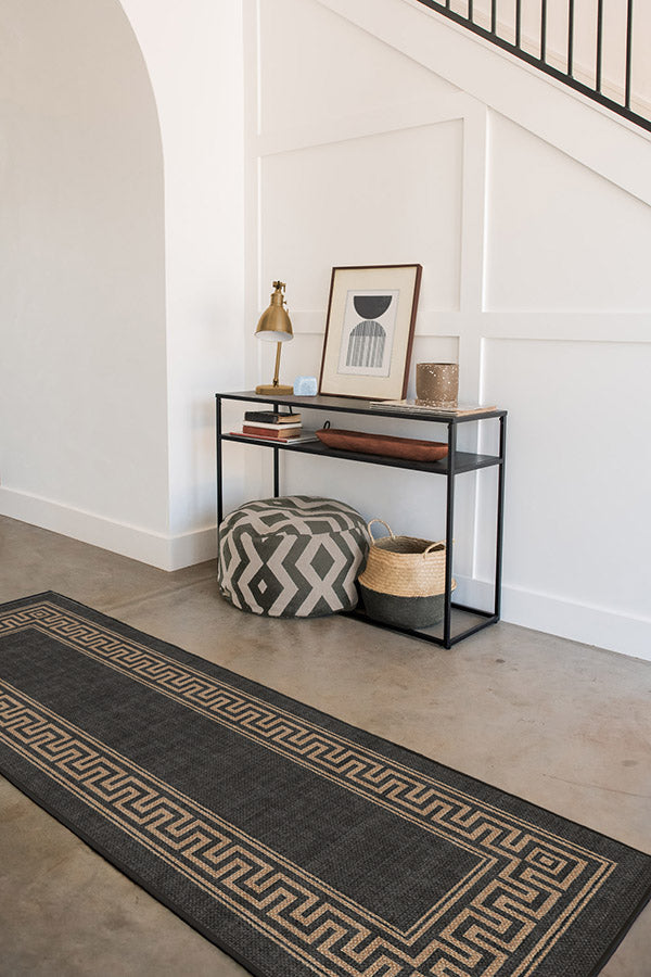 Gray Jute Rug in Front of White Front Door with X Trim