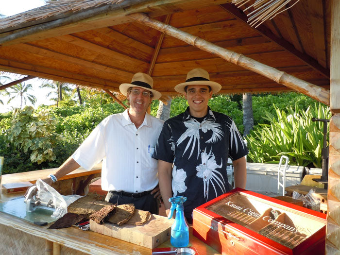 Les Drent (Owner) and Tai Erum (Cigar roller) awaiting the arrival of the event guests. 