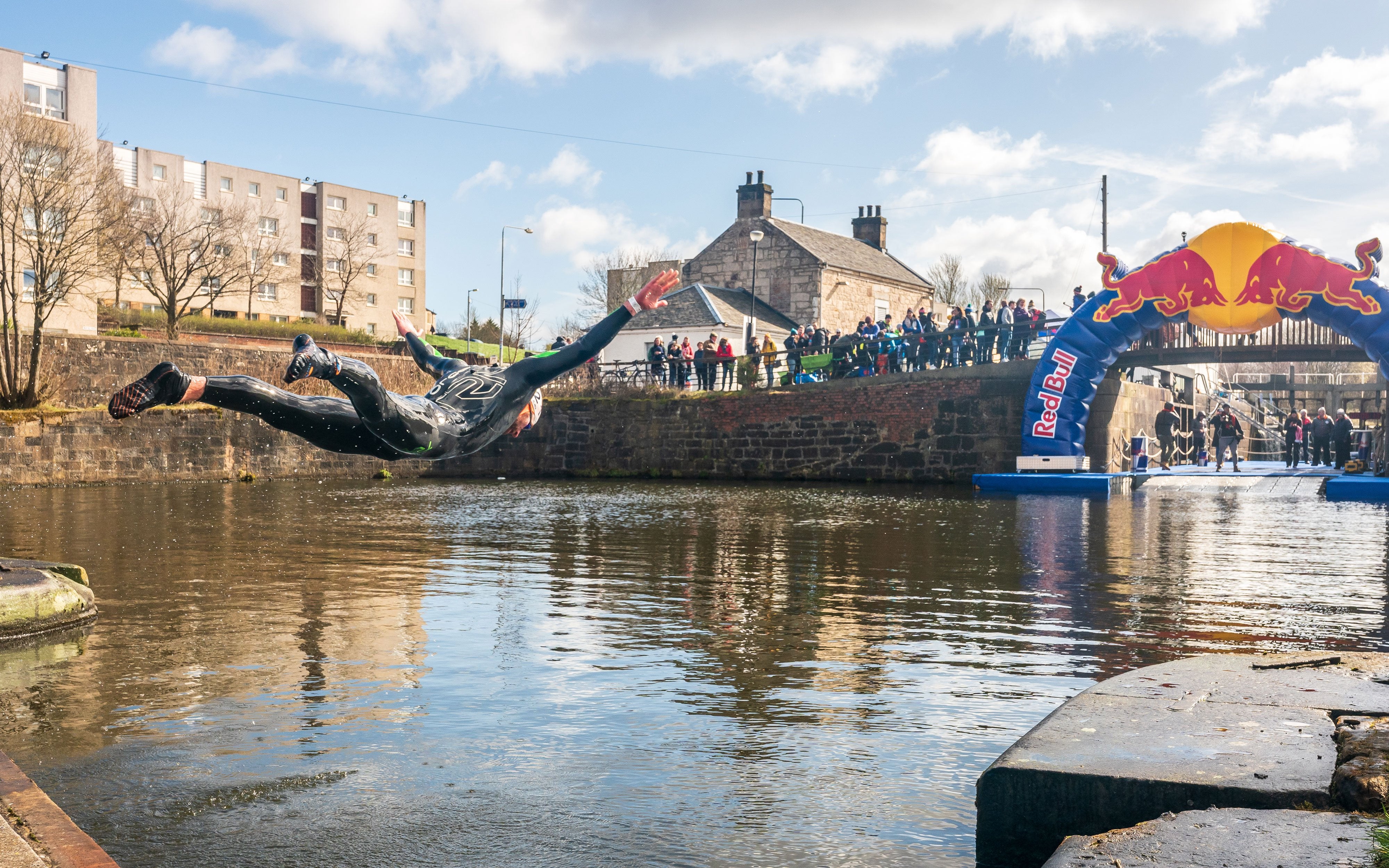 Bell diving into the canal at Red Bull Neptune Steps, Glasgow