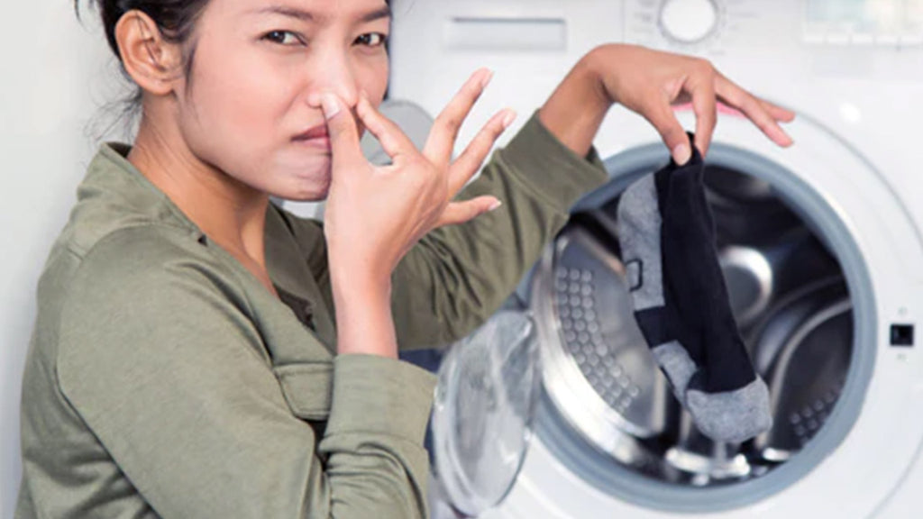 washing machine smells bad uk