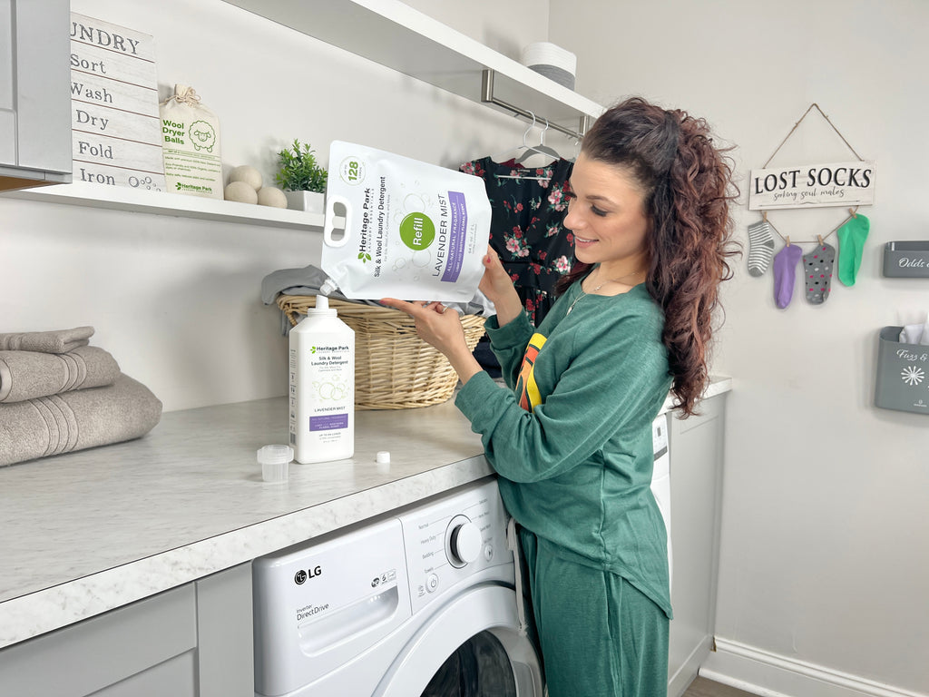 Woman refilling a laundry detergent bottle