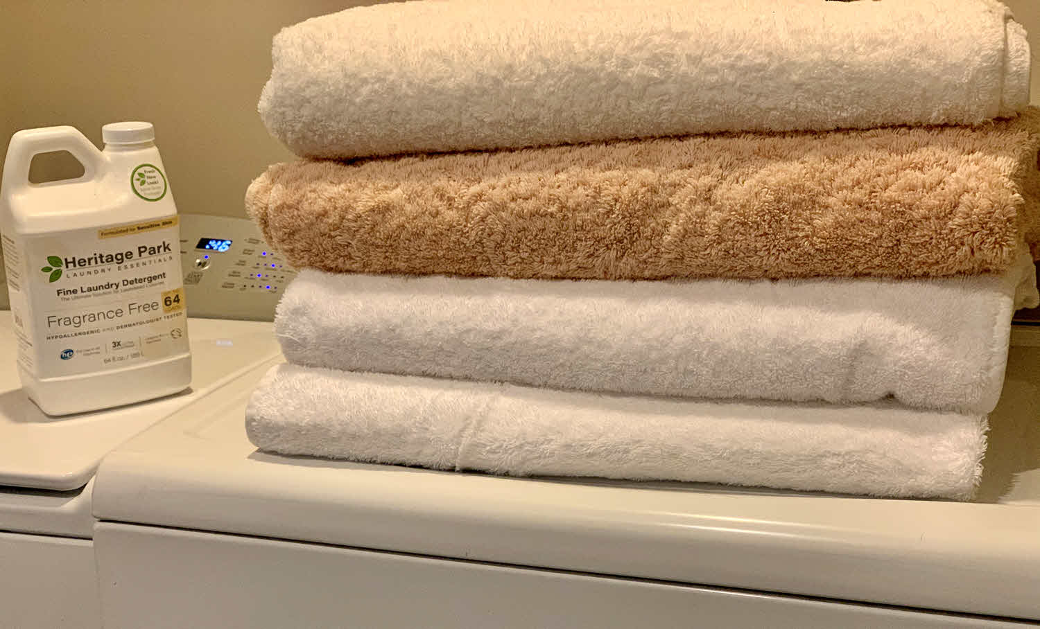 https://cdn.shopify.com/s/files/1/1035/1721/files/Stack-of-clean-towels-on-top-dryer-03.jpg?v=1604527873