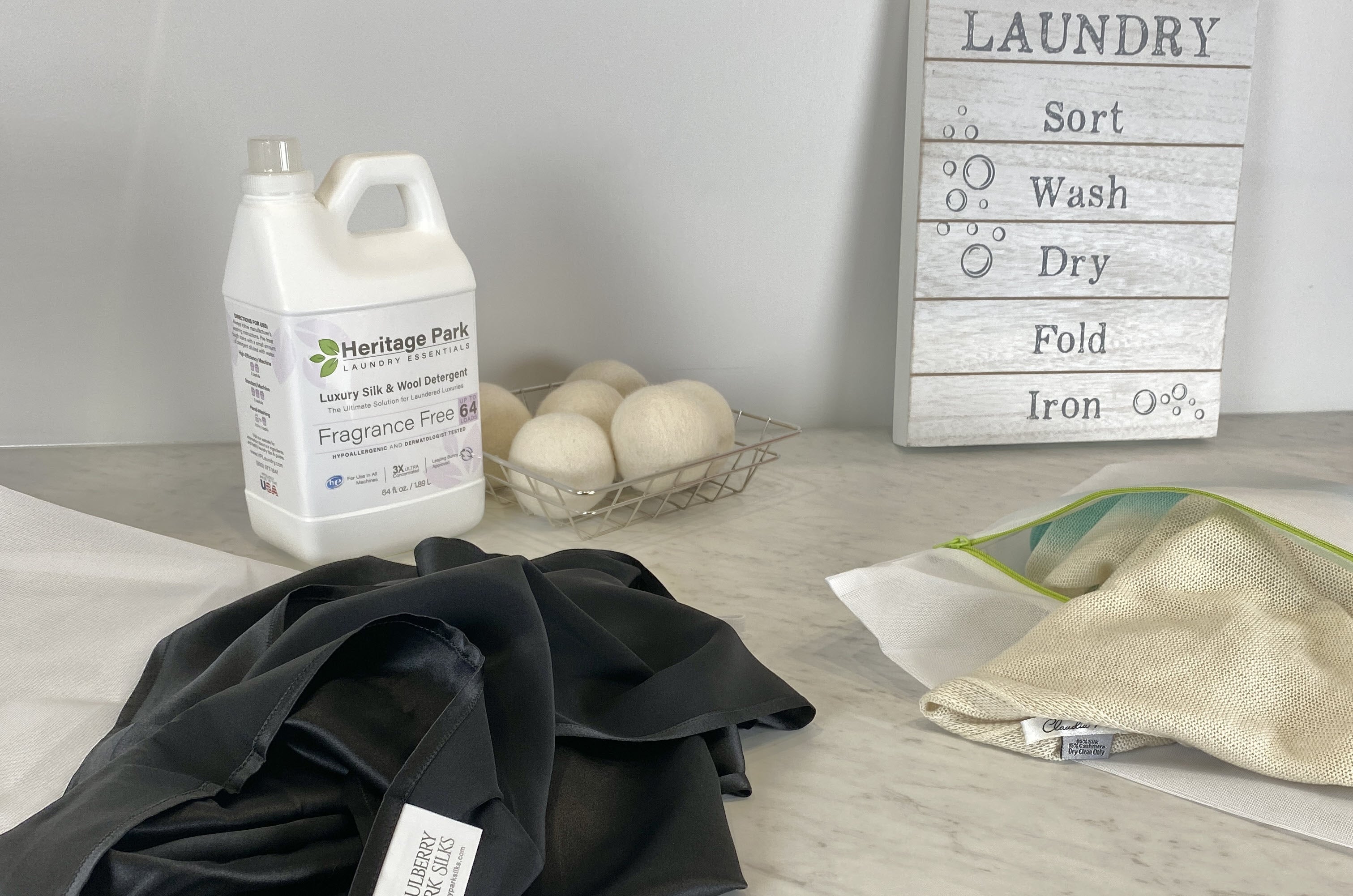 How To Wash Cashmere, Wool, Silk, and Other Luxury Fabrics Safely -  Heritage Park Laundry Essentials