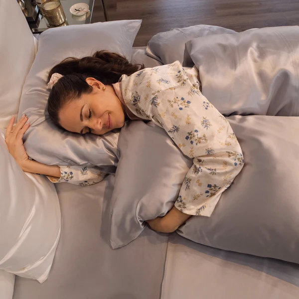 Woman sleeping on a silk pillowcase