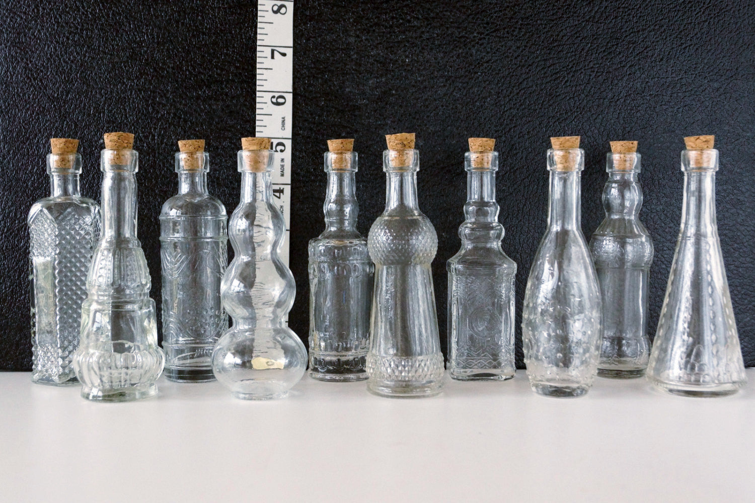 Download Decorative Clear Glass Bottles with Corks, 5" tall (Set of 10) - ThirdShiftVintage.com