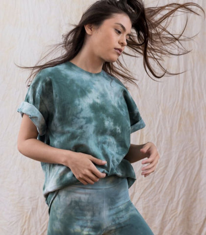 A sage green tie dye shirt. The perfect addition to any outfit.