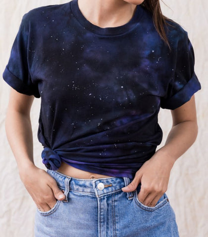 A dark galaxy tee that's perfect for space enthusiasts! This shirt is sure to turn heads and start conversations.