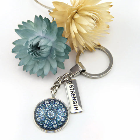 VINTAGE SILVER KEYRING WITH ' STRENGTH ' CHARM - FLORAL ICE