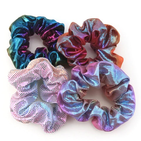 pack of four sparkly scrunchies in shades of purple, pink and blue