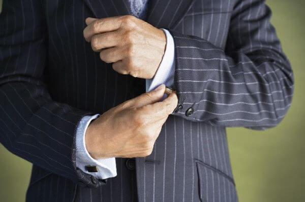 A man in a pinstripe suit