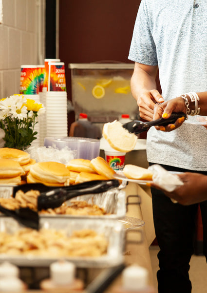 people eating central bbq catering