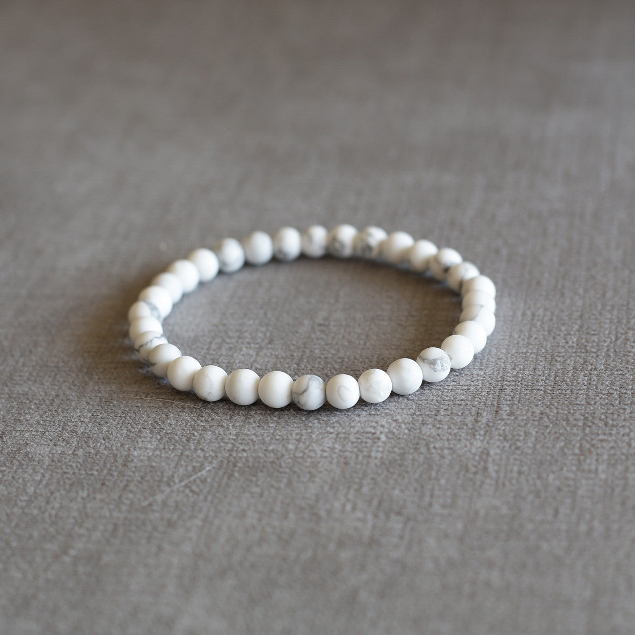 white bead bracelet