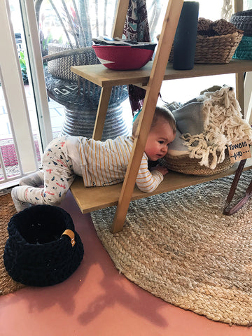 baby in shop dreamers and drifters byron bay