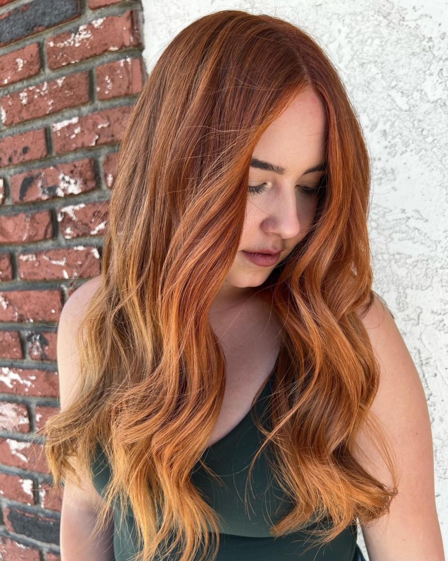 11. Soft Cinnamon Layers with Mid-Length Waves (Fall Hair Colors)