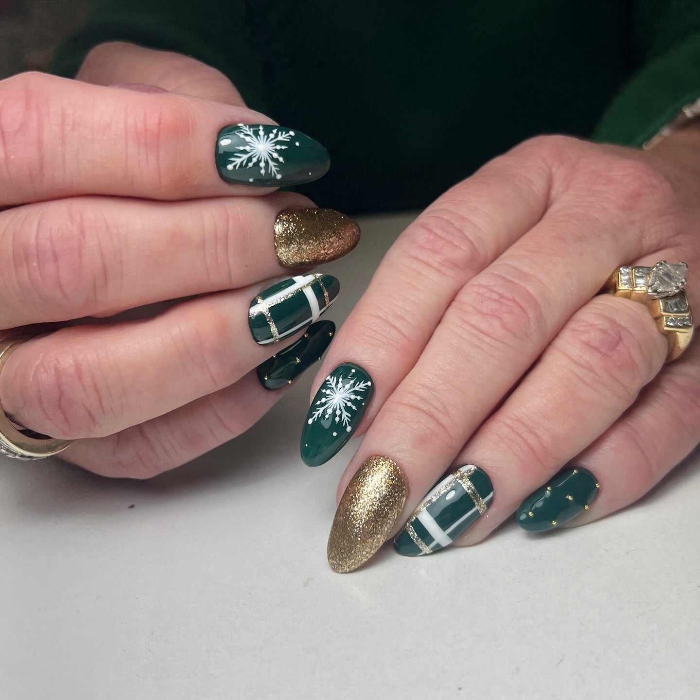 18. Deep Green and Gold Gift Wrap Nails (Green Christmas Nail Ideas)