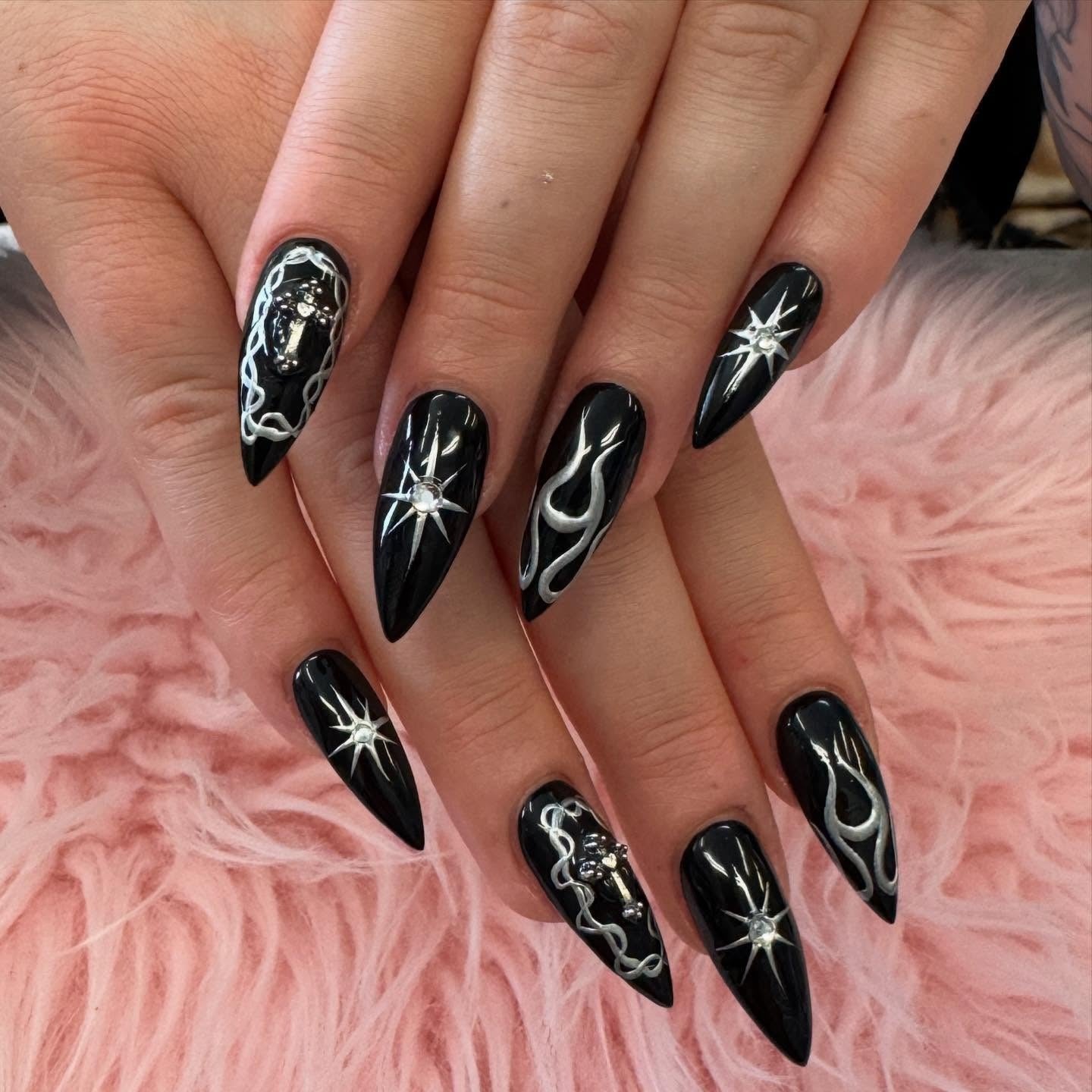 19. Chrome Flame and Starburst Nails (Black Nail Ideas)