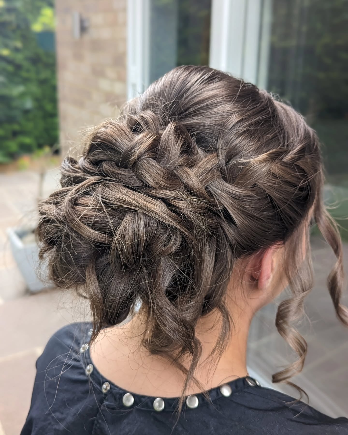 21. Braided Textured Bun with Ash Brown Highlights (Prom Hairstyles)