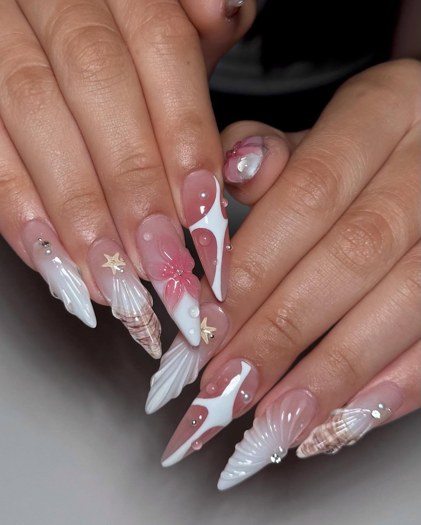 4. Seashell Bloom Stilettos in Nude and White Swirl (Bling Nail Ideas)