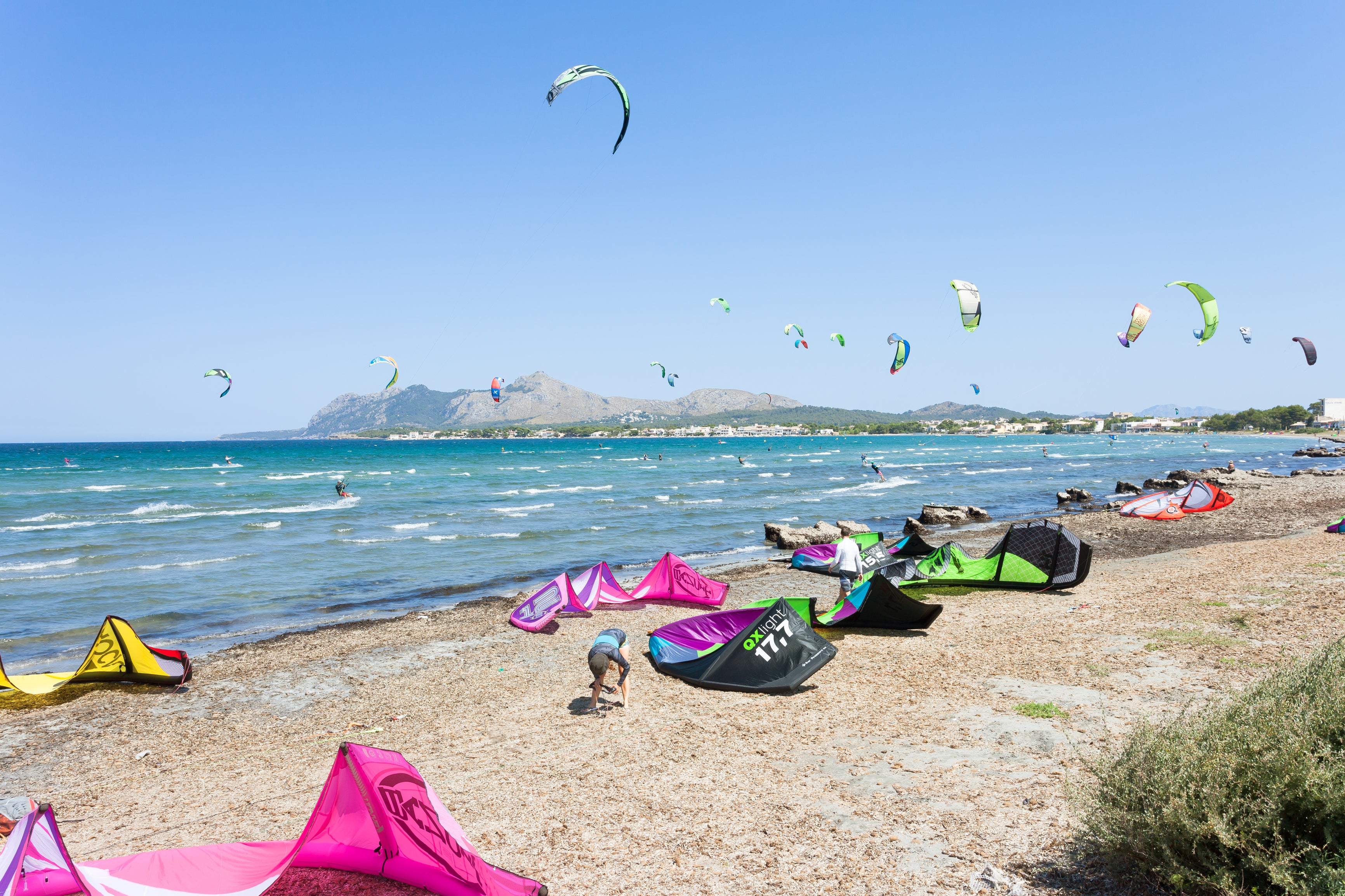 9. Try Water Sports - Alcudia, Mallorca Kitesurfers at the windy beach