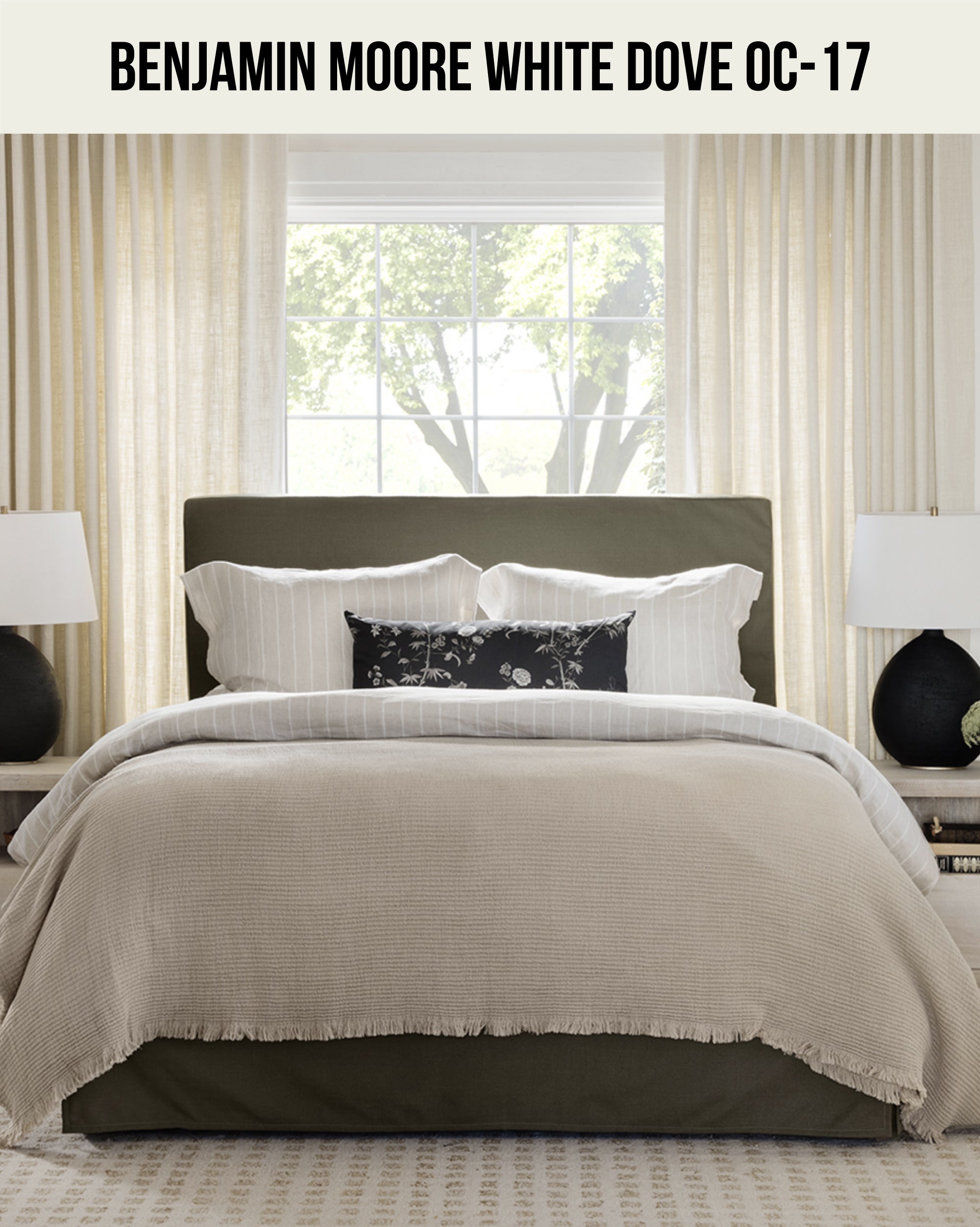 A bed with pillows and a lamp on the side with Benjamin Moore White Dove painted walls (Benjamin Moore White Dove OC-17)